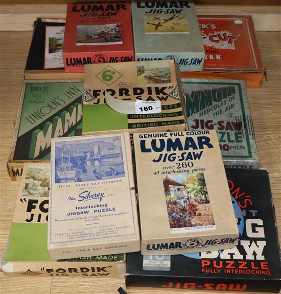 Eleven vintage jigsaws, Lumar and Waddington